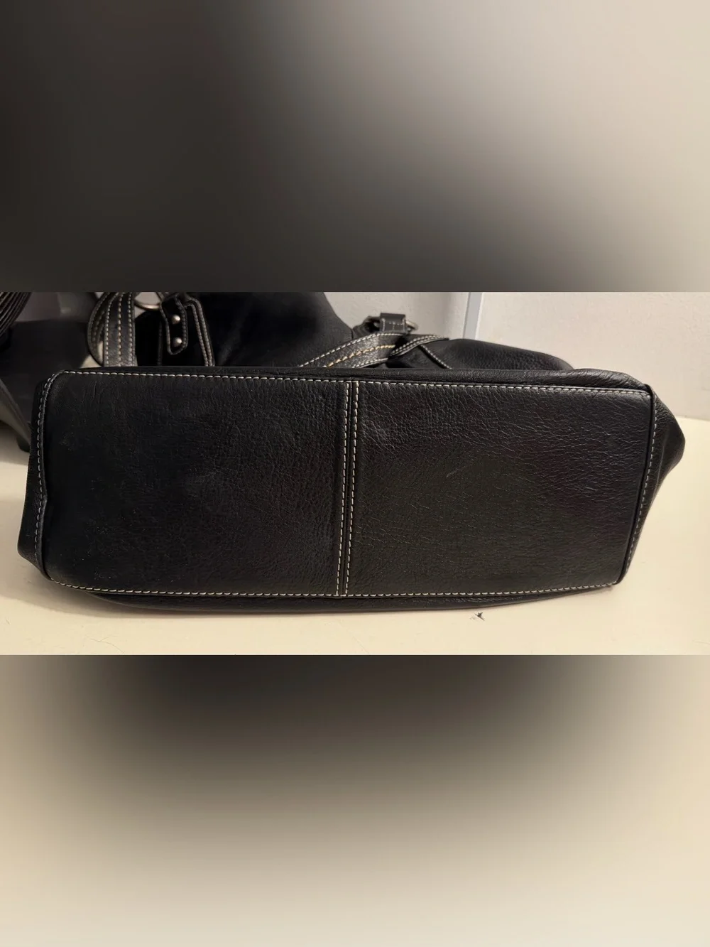 The Sak “PO Asbury” large pebbled black leather hobo/shoulder bag.